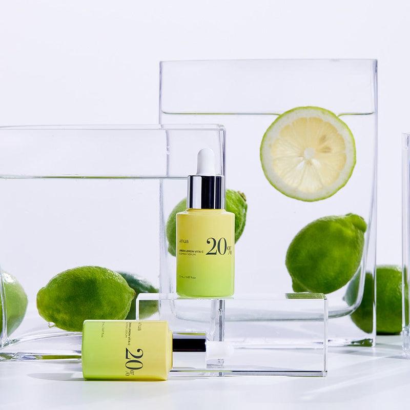 Anua Vitamine C Serum productfoto met citrusvruchten en glaspresentatie – Koreaanse skincare voor een stralende heldere huid
